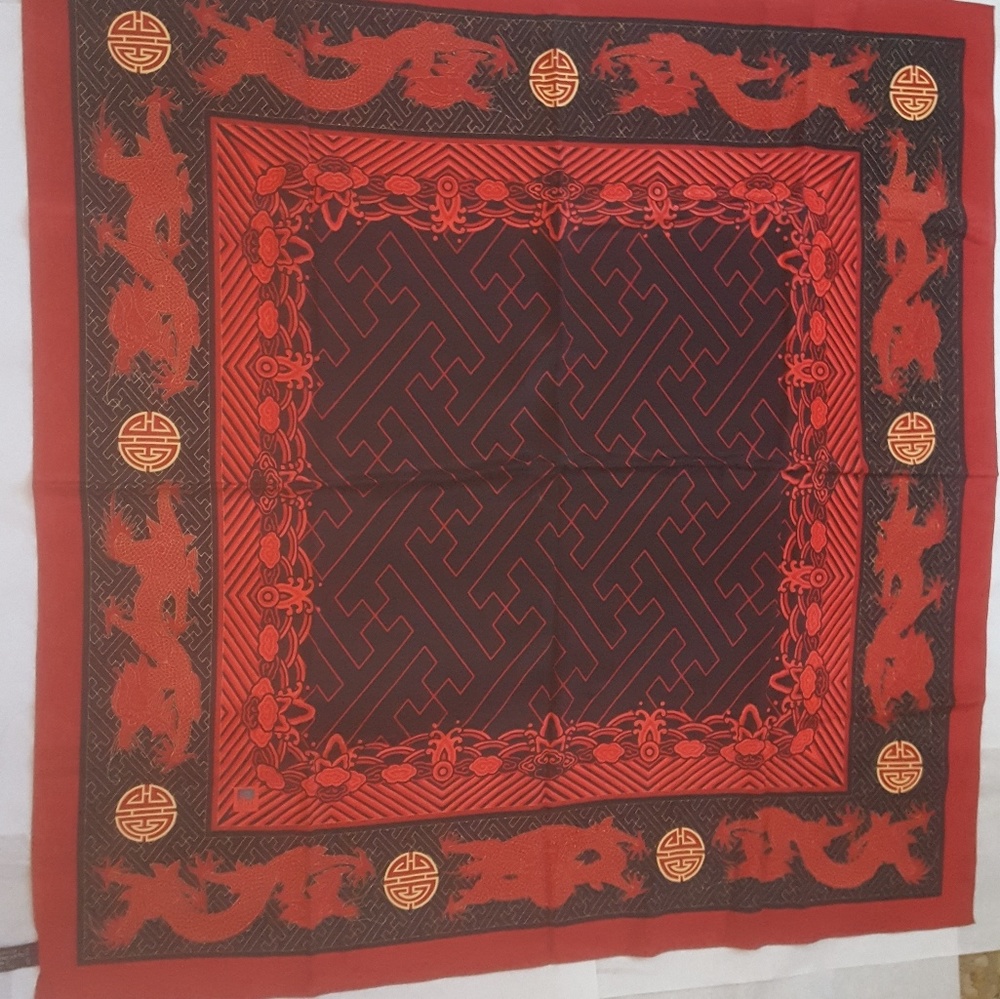 Rich looking black, red and gold scarf from th Mus